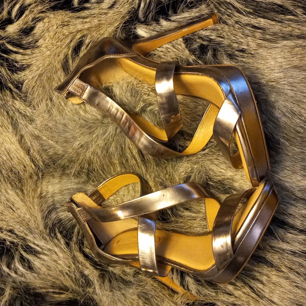 Adorable pair of strappy heels by BCBG